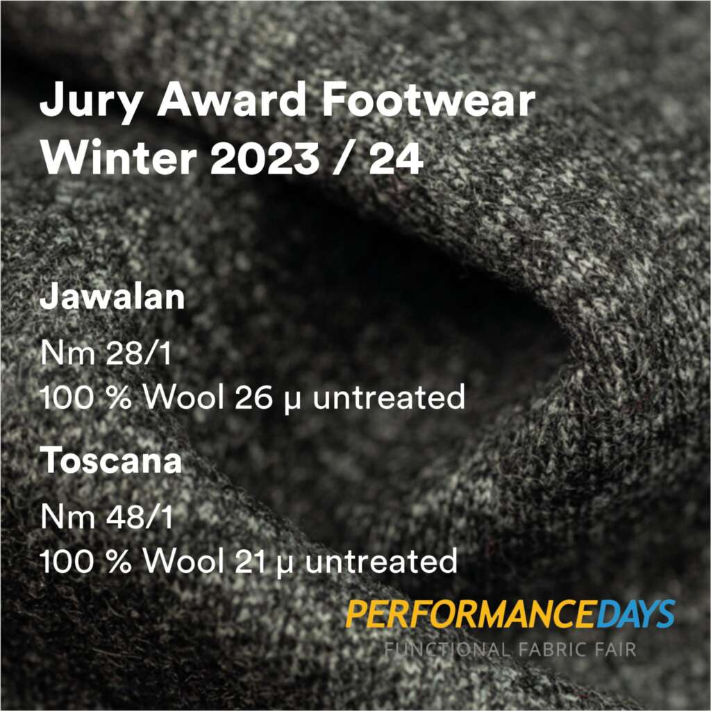 Close-up of textured gray wool fabric with text about Jury Award Footwear Winter 2023/24 for Jawalan and Toscana wool fabrics. Performance Days logo in the lower right corner.