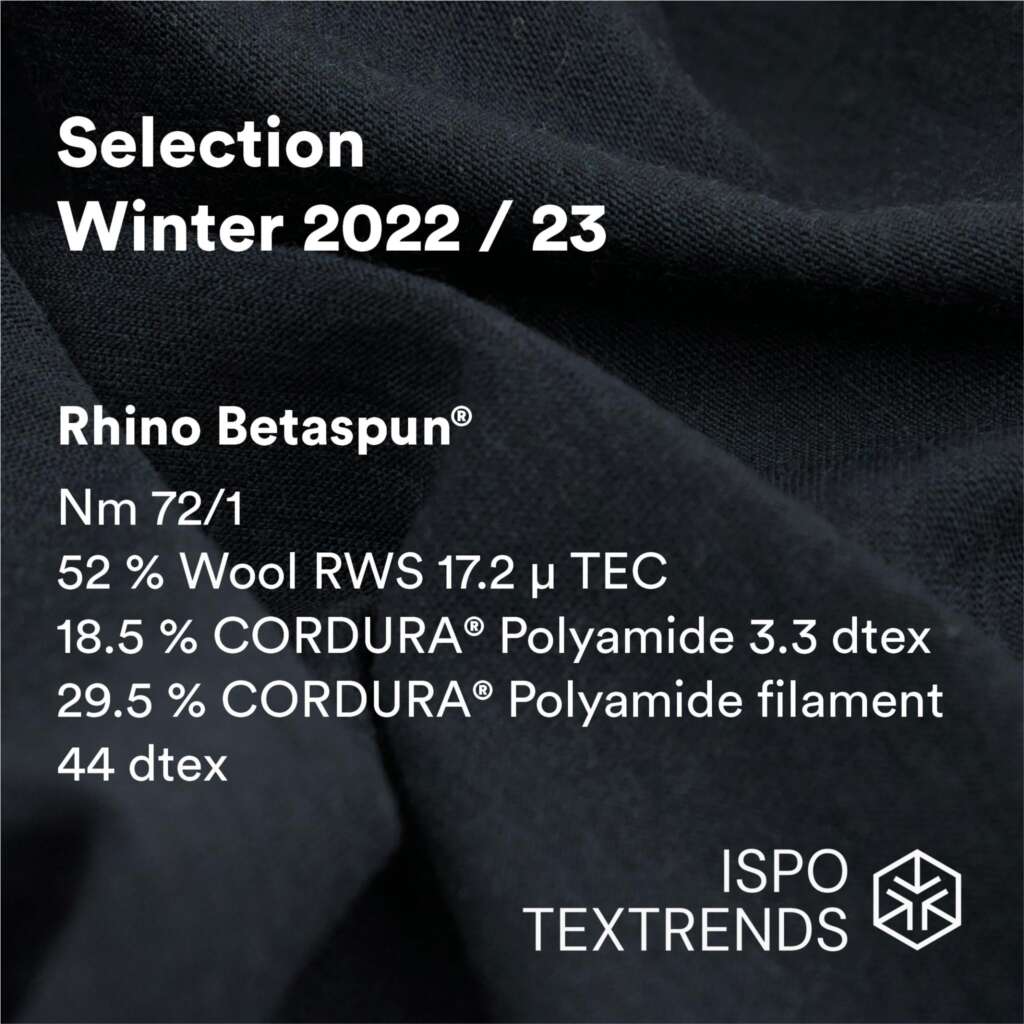 Black fabric background with white text listing details for Rhino Betaspun® yarn: wool, polyamide, and filament content percentages, yarn counts, and ISPO Textrends logo in the corner.